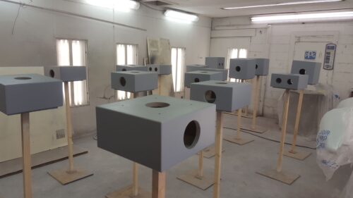 Half modules getting painted with primer for the first photo shoot